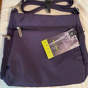 Travelon Anti-Theft Classic N/S Crossbody in Purple. NWT.